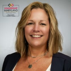 Headshot of Carolyn Teigland with the Leadership Maryland Logo